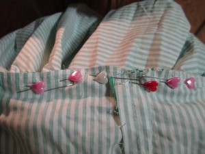 Once I got my gathers evenly spaced, I pinned it to the bodice using a lot of pins. I wanted to be sure the gathers would stay in place and not un-even themselves while being sewn to the bodice.