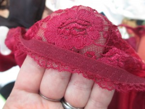 On the underside of the lace is elastic! So no worries about ribbon or a tight edge cutting into full-on-top breasts.