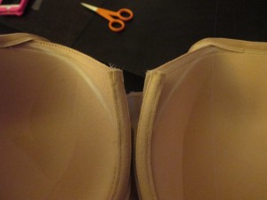 Now that everything was taken apart (but not completely removed from the bra), I marked where I planned to cut the foam with white chalk.