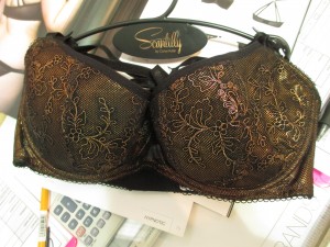 How amazing is this metallic bronze Ignite half-cup bra? It has a double-strap criss-cross in the back.