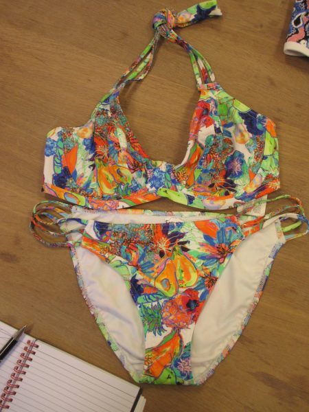 Island Girl has kind of an ugly print, in my opinion, but the triple-string straps are super cool! (Banded halter bikini starts at 28, up to GG).